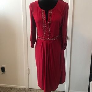 Beautiful beaded red dress, v- neck line.